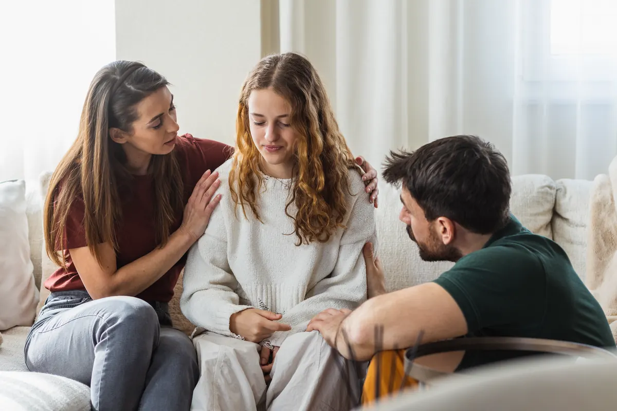 Family meeting together in a counseling setting